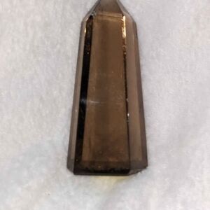 Elegant Brown Crystal Obelisk